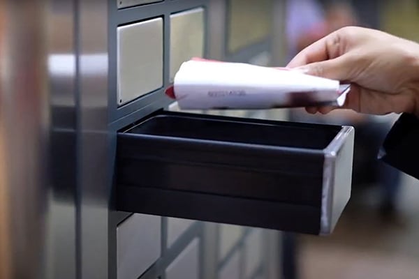 ecos_drawer_m4_hand_puts_documents_600x400